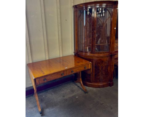 A Regency style yew wood sofa table and a burr walnut corner display cabinet 