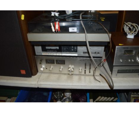A Techtronic turntable together with a Technics stereo cassette deck and a Scott integrated amplifier