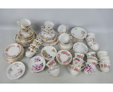 A collection of floral decorated tea wares comprising cups saucers and plates. [2] [SW]

NOTE: THIS LOT IS NOT AVAILABLE FOR 