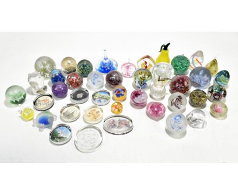 A large collection of assorted contemporary glass paperweights including Mdina, Avondale and Caithness examples (42).Addition