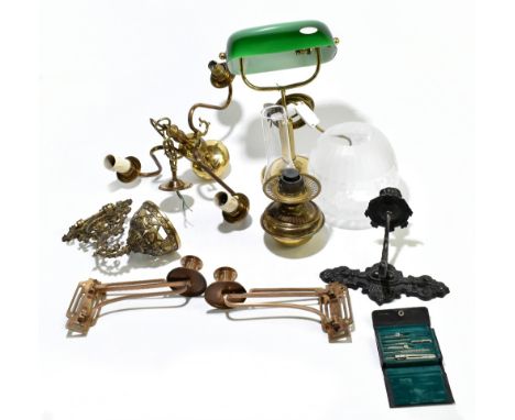 An Edwardian-style brass desk lamp, with adjustable green glass shade, together with a brass wall mounted oil lamp with glass