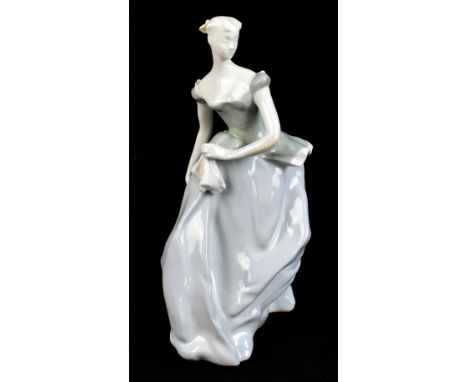 A circa 1950s Lomonosov (USSR) figure representing a lady wearing a flowing evening dress, stamped and dated 1959 to the base