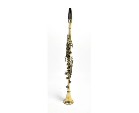 An unnamed brass plated clarinet, cased.