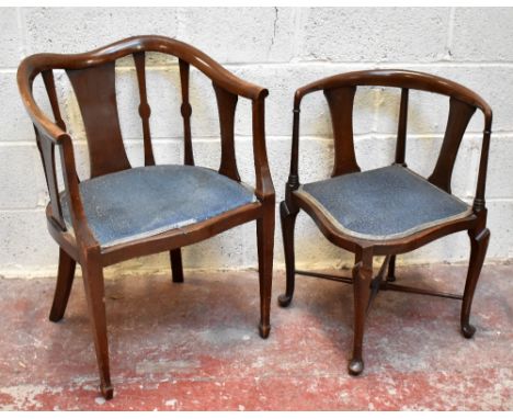 An Edwardian mahogany corner chair on tapered legs on pad feet, height 69.5cm, and an Edwardian mahogany tub chair (2).Additi