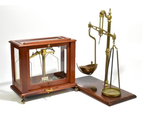 BAIRD &amp; TATLOCK; a set of lacquered brass laboratory scales, in mahogany case, height 34cm, width 39cm, together with a s