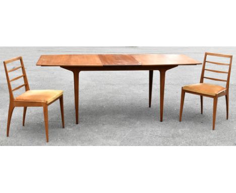 MACINTOSH; a mid century teak pull out extending dining table, length unextended 152cm, height 74cm, together with teak four 