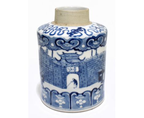 A late 19th century Kangxi style blue and white tea canister, decorated throughout with an encircling pattern of a fortress, 