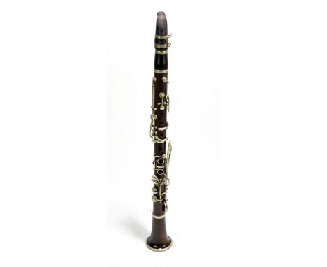 A simulated rosewood simple system clarinet, cased.