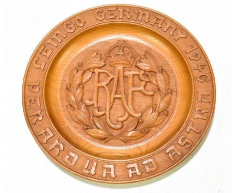 RAF; a carved wooden plaque bearing RAF device to centre and further inscribed 'Lemgo Germany 1946, Par Ardua ad Astra', diam