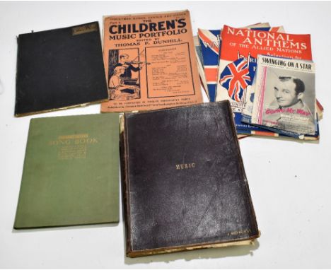 A collection of sheet music including a late 19th/early 20th century album with interesting contents including pictorial cove