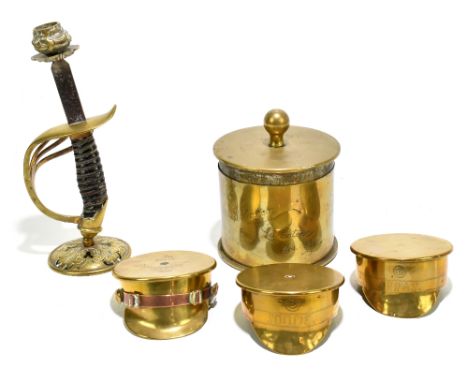 A group of assorted Trench Art including a candlestick made from the grip and partial blade of a sword, height 24cm, three WW