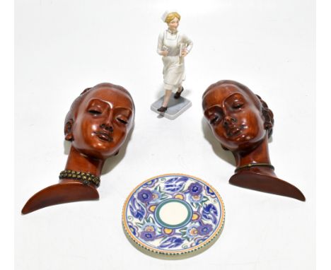 A pair of Achatit Handarbeit Art Deco style female wall masks, both with impressed marks and one with original paper label, l