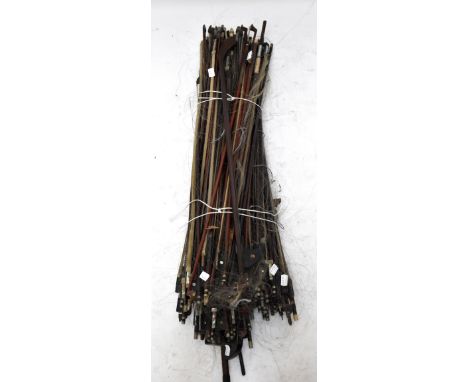 A large collection of assorted violin, viola and violoncello bows, the vast majority nickel mounted and in need of restoratio