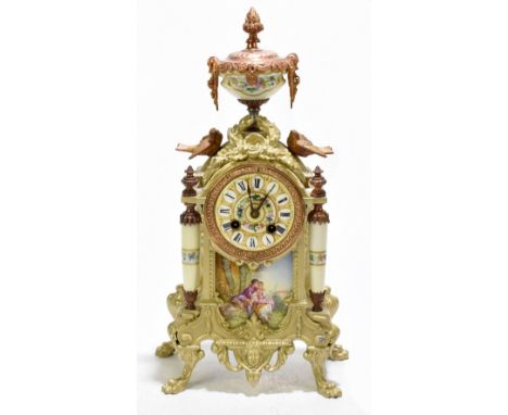 A late 19th century French painted and patinated spelter porcelain mounted eight day mantel clock, the floral dial with Roman