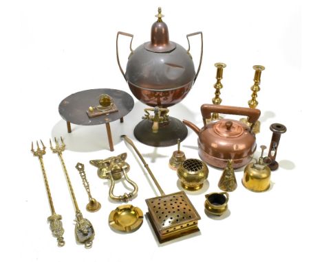 A collection of assorted 19th century and later metalware including a copper twin handled tea urn, a pair of brass candlestic