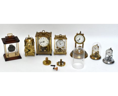 An assortment of seven mantel timepieces including a Smiths battery operated lantern timepiece, a brass Kundo anniversary tim