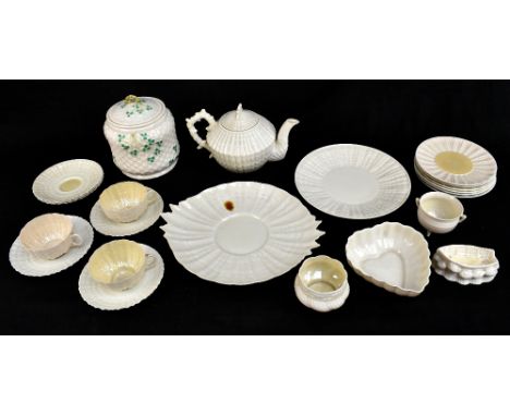 BELLEEK; a collection of items to include a biscuit barrel and cover decorated with clover against a basket weave ground, 16c