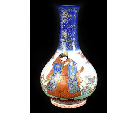 A Japanese porcelain vase of baluster form decorated with geisha and figures, each wearing kimonos within landscape and gilt 