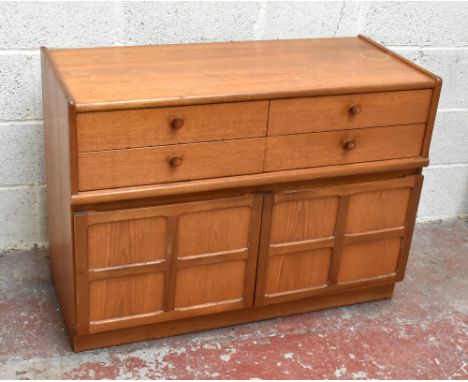 NATHAN FURNITURE; a teak side unit, with four short drawers and two panelled cupboard door, on plinth base, height 75cm, widt