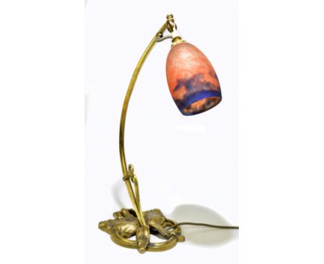 An Art Nouveau bronzed table lamp with cast floral decoration to the base, with Muller Freres mottled glass shade, height 50c