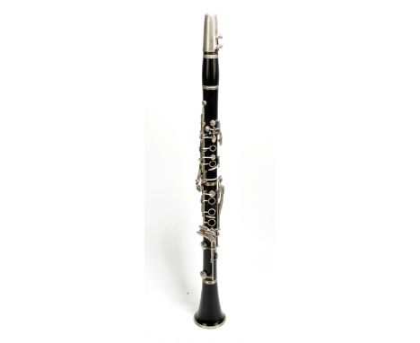 WARNER; an ebonised clarinet, cased.