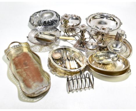 A collection of 19th century and later silver plated wares including a three branch candelabrum, a pierced silver pedestal bo