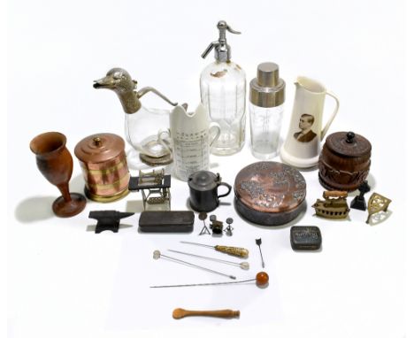 A collection of 19th century and later metalware, ceramic and treen items including a novelty white metal mounted claret jug 