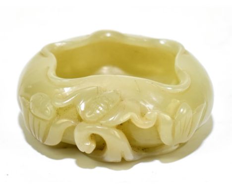 A Chinese carved jade scholar's brush washer with carved floral decoration, diameter 5cm.Additional InformationMinimal wear t