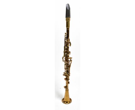 An 'American Victory' brass clarinet, cased.