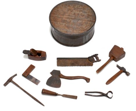 An early 20th century miniature tool set comprising plane, chisel, pliers, axe, mallet, set square, saw and two hammers, in a