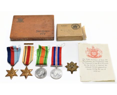 A four piece WWII medal group comprising Defence Medal, 1939-45 Star, Africa Star, and a WWII Service Medal awarded to Charle