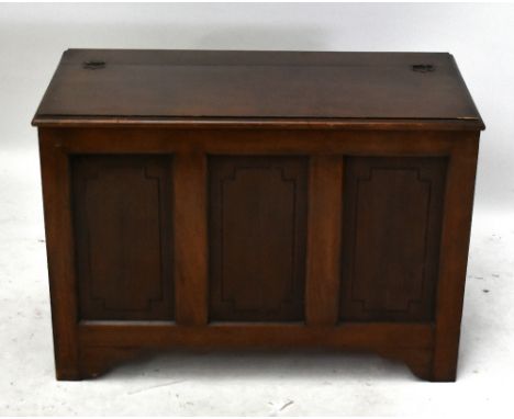 A 1930s oak blanket box, with hinged lid and panelled front, height 63cm, width 89cm, depth 44cm.Additional InformationGenera
