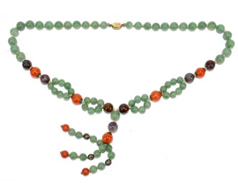 A strand of jade and hardstone beads, the amber coloured beads set within cloisonne mounts, length 42cm.