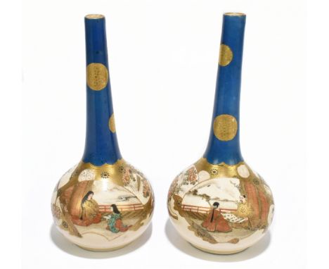 A pair of Japanese Meiji period satsuma onion vases, with turquoise necks gilt heightened with floral motifs, above panels of