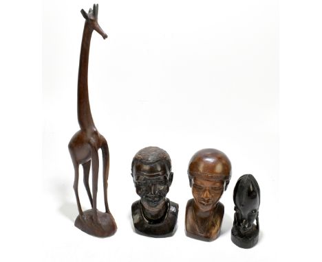 ETHNOGRAPHIA; three Nigerian carved hardwood heads, the tallest 19cm, and a West African carved and painted wood model of a g