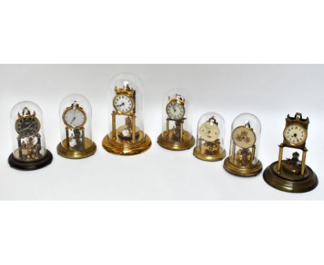 Six anniversary mantel timepieces including three by Kundo and another signed for Violeta (two lacking domes) (7).Additional 