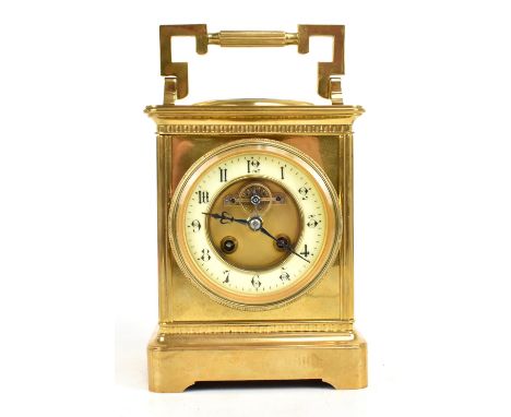 A 19th century French brass cased combination bracket clock and barometer, the chapter ring set with Arabic numerals, the mov