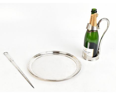 A silver plated Champagne bottle holder with cast beaded decoration to the handle and engine turned detail to the body, heigh