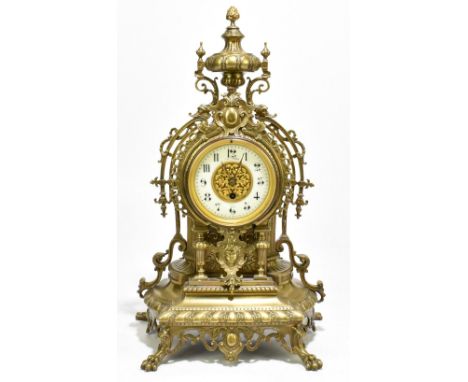 A late 19th century French brass mantel timepiece, with Roman numeral chapter ring and movement stamped Ls Boname Hors Concou