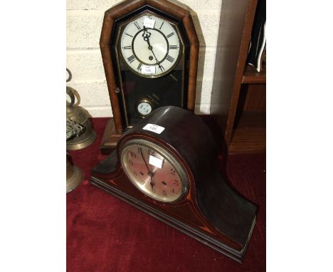 An early-20th century inlaid mahogany mantel clock with gong-striking movement and a walnut-cased American mantel clock with 