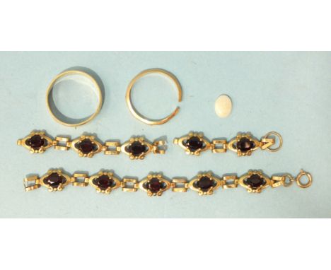 Two 9ct gold wedding bands, sizes Q and M, (sawn through), 4.2g, a garnet-set 9ct gold bracelet in three pieces and a small u