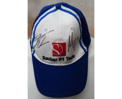 MOTORACING - SAUBER F1 TEAM BASEBALL CAP SIGNED BY TWO
Light marks.
Ref. T.
