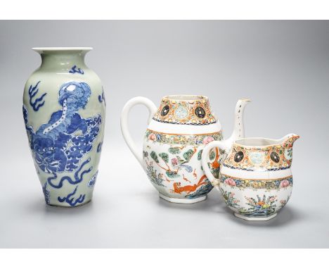 A Chinese celadon glazed vase, 24cm and a Chinese famille rose teapot and matching cream jug, a.f.