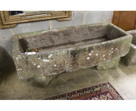 A 19th century carved stone bow fronted trough, length 133cm, depth 57cm, height 54cm