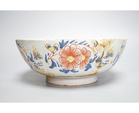 An 18th century English polychrome delftware bowl, interior inscribed "Success to The British Arms", 26cm, diameter, cracked 