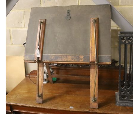 An early 20th century brass mounted folio stand together with a reading lamp