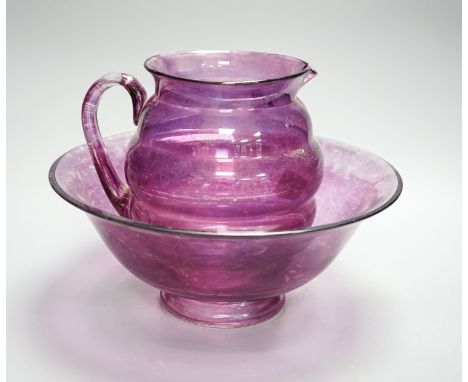 An amethyst flashed glass basin and jug.