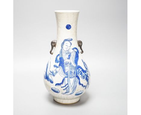 A Chinese crackle glaze porcelain two handled vase, painted in underglaze blue, seal mark, 27cm