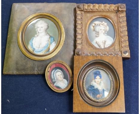 A group of four framed portrait miniatures, tallest 9cm