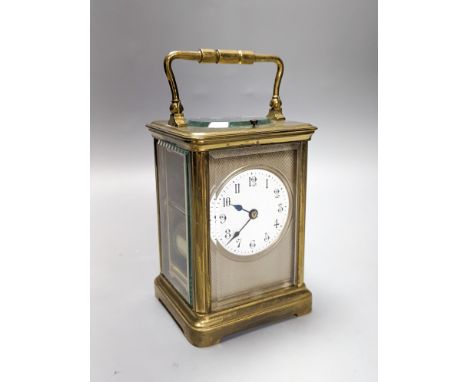 A French brass repeating carriage clock with key. 13.5cm